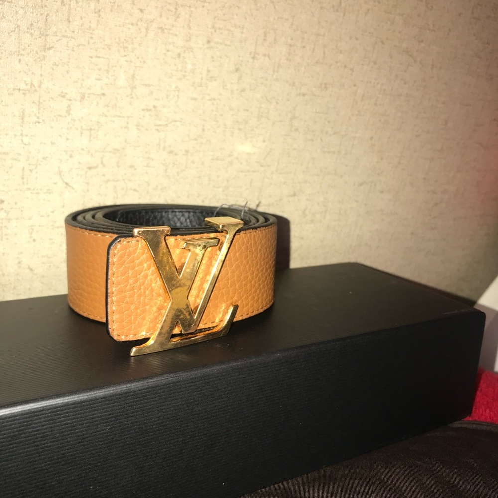 Authentic Louis Vuitton black and brown reversible belt w/gold LV belt buckle
